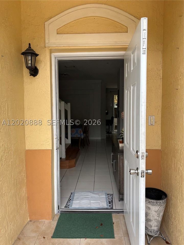 6920 Nw 177th St #Q101 - Photo 2 of 18