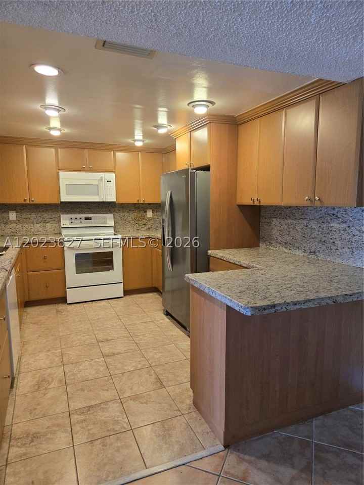 9735 Nw 52nd St #208 - Photo 2 of 15