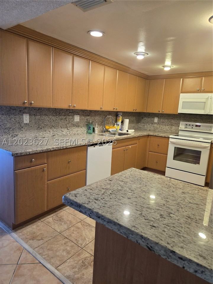 9735 Nw 52nd St #208 - Photo 3 of 15