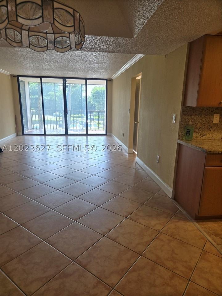 9735 Nw 52nd St #208 - Photo 4 of 15