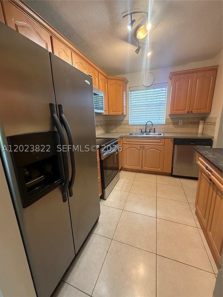 5080 Sw 64th Ave #104 - Photo 2 of 15