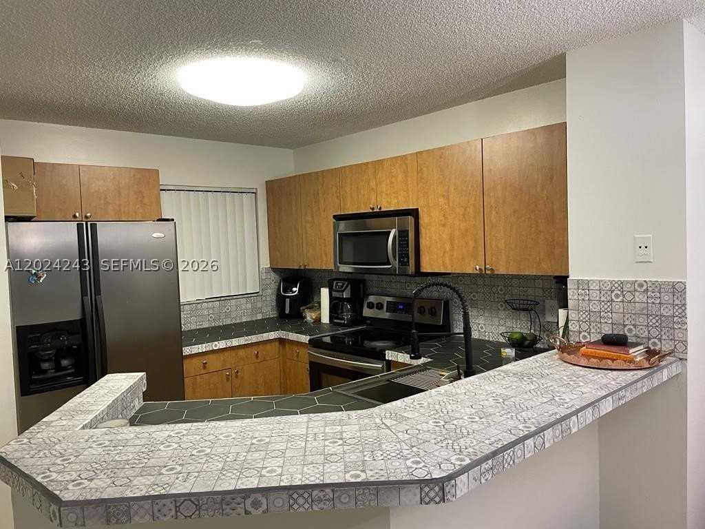 8750 N Sherman Cir #208