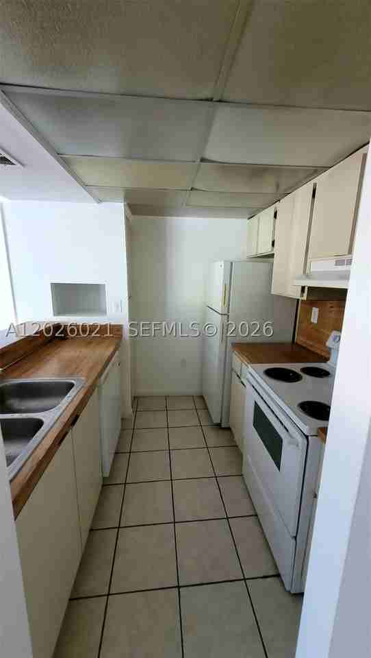 6995 Nw 186th St #E301 - Photo 2 of 13