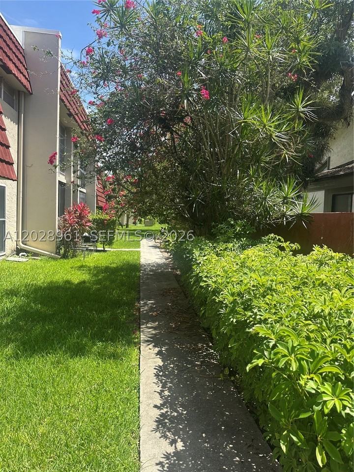 5 Jacaranda Country Club Dr #206 - Photo 2 of 9