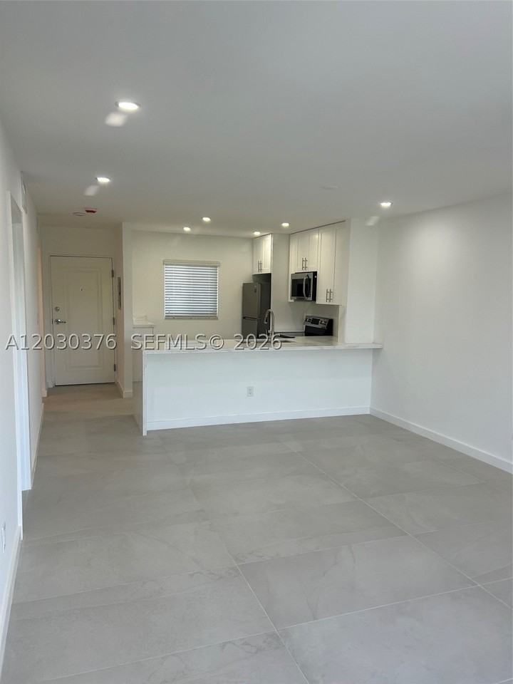 7732 Camino Real #F404 - Photo 2 of 12