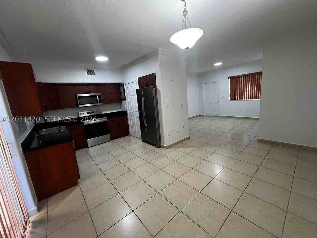7281 Nw 174th Ter #103 - Photo 2 of 8
