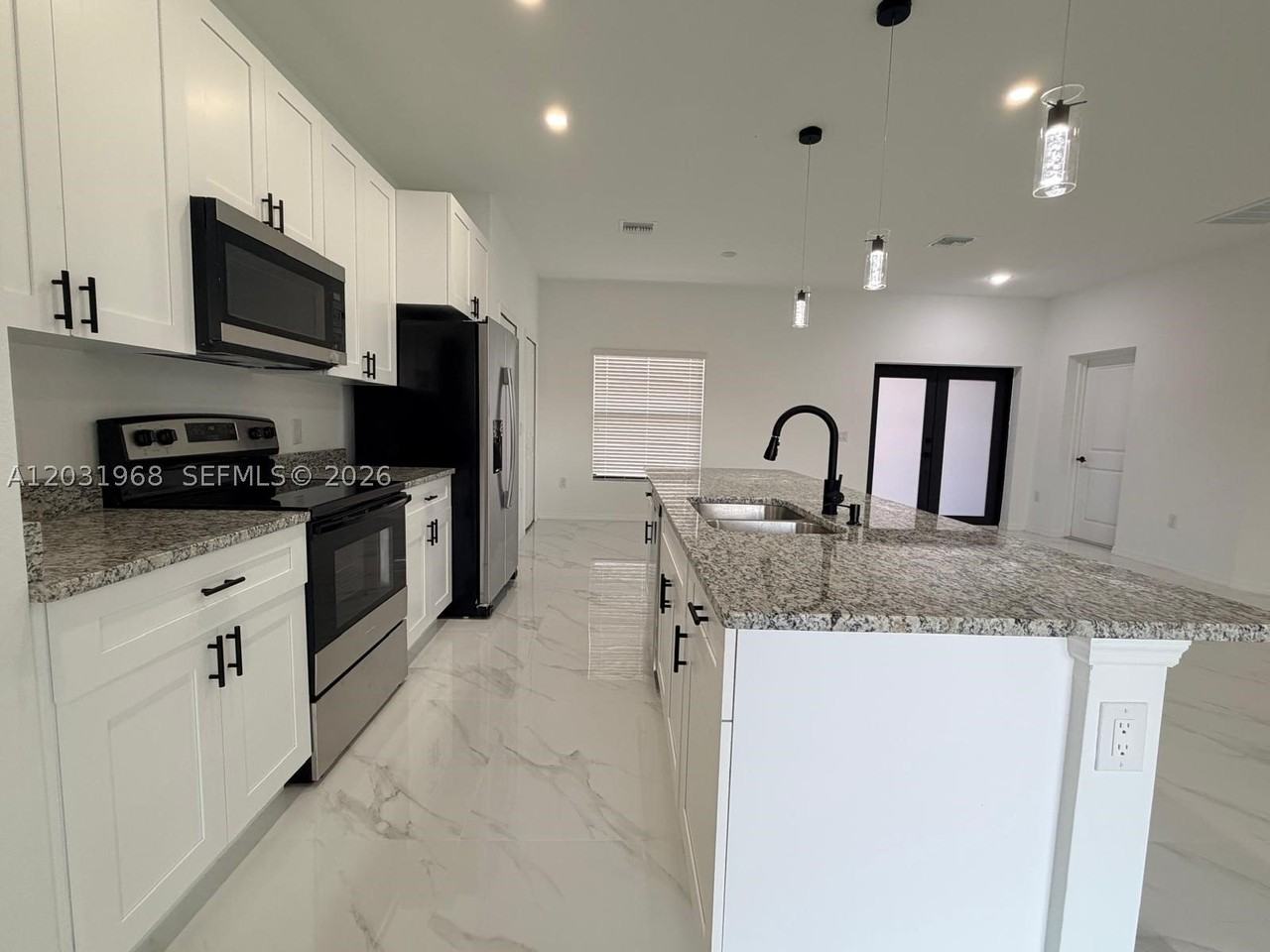 2706 72nd St W - Photo 4 of 21