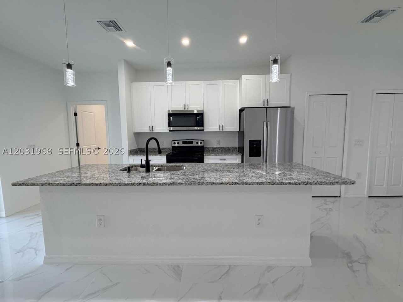 2706 72nd St W - Photo 5 of 21