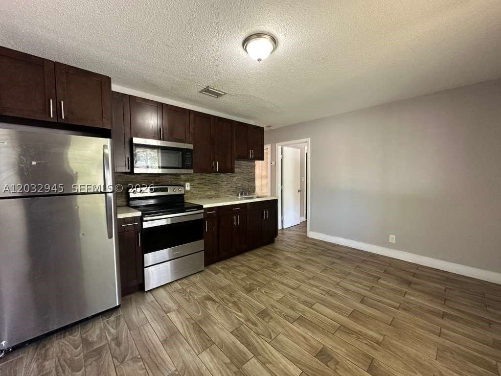 647 Nw 3rd Ave #1 - Photo 3 of 9