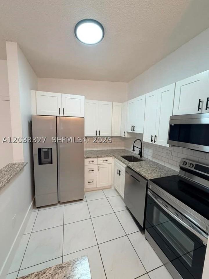 9499 W Mcnab Rd #208 - Photo 3 of 6