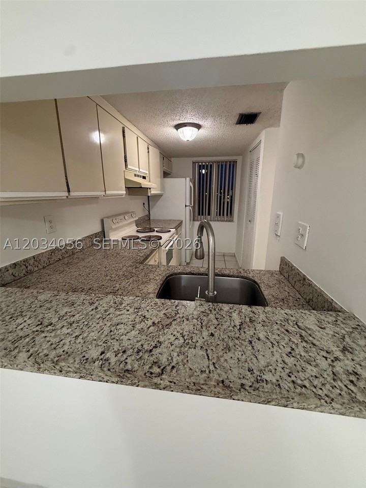 9917 W Okeechobee Rd #3-510 - Photo 2 of 10