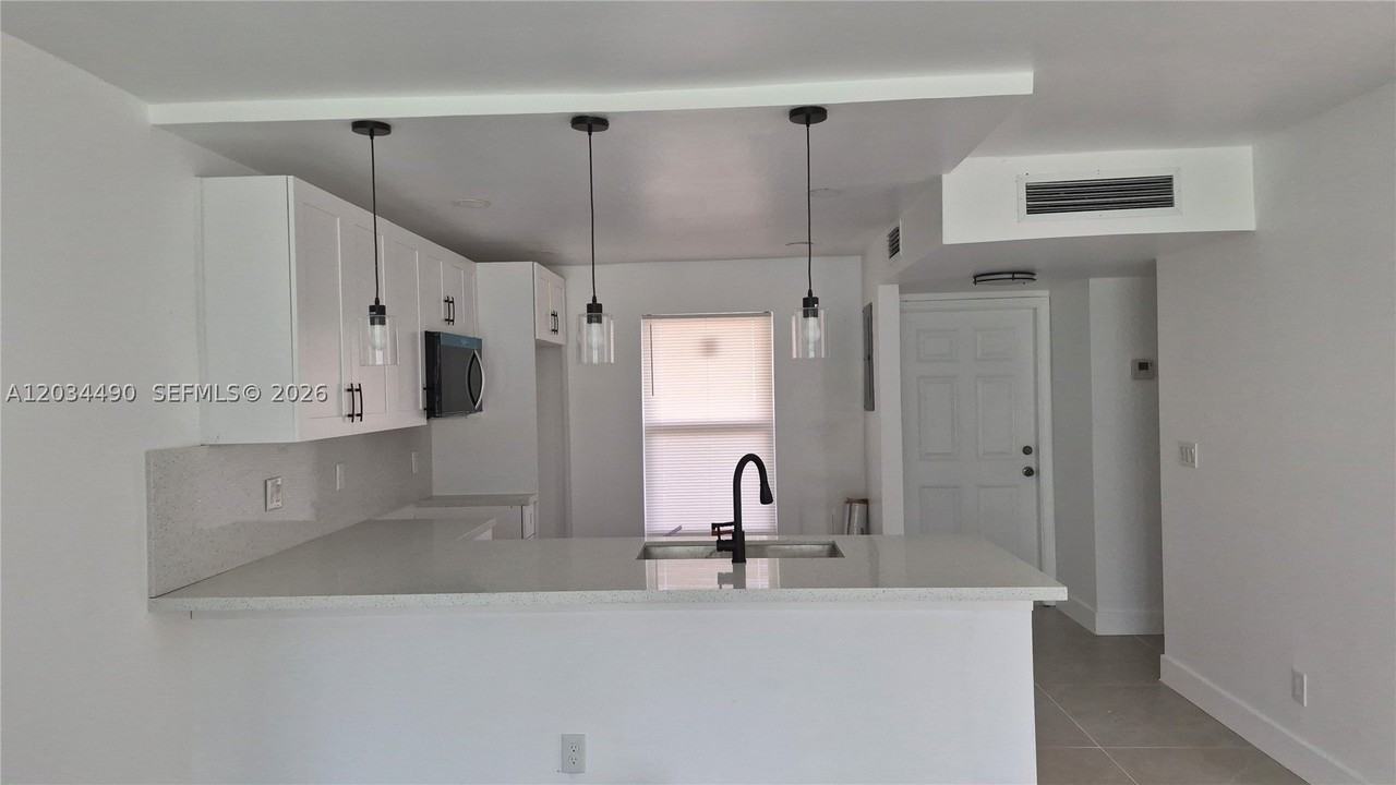 6050 Nw 64th Ave #105 - Photo 3 of 18