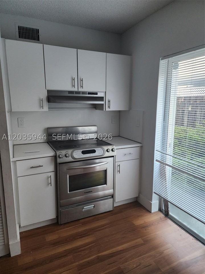 10019 W Okeechobee Rd #102 - Photo 6 of 11