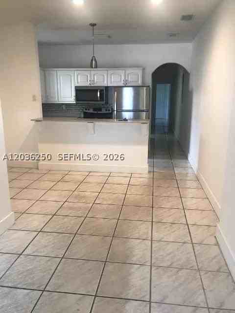3244 Sw 3rd St #L - Photo 3 of 15