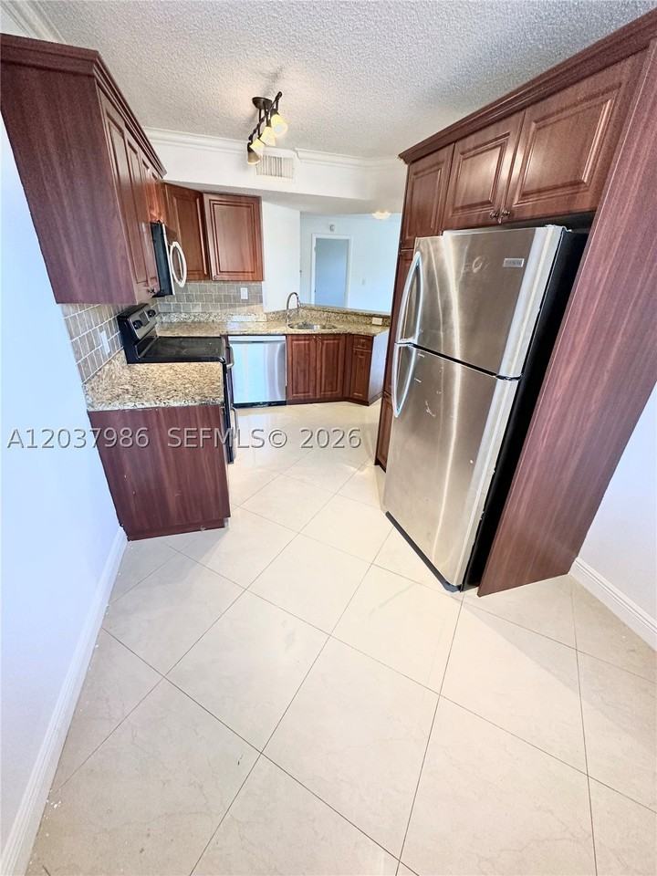 8955 Wiles Rd #208 - Photo 6 of 29