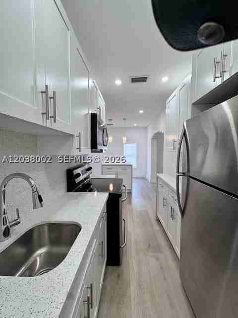 4783 Nw Flagler Ter - Photo 7 of 14