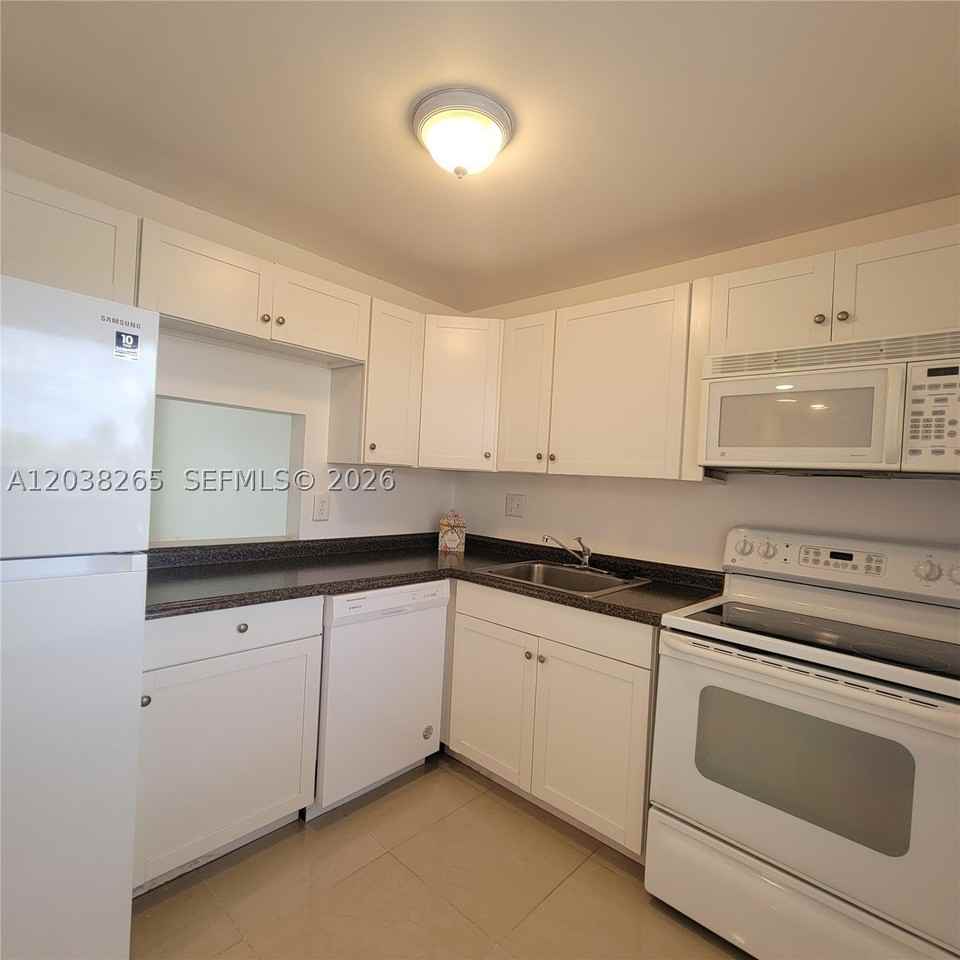 6021 Nw 61st Ave #207 - Photo 2 of 32