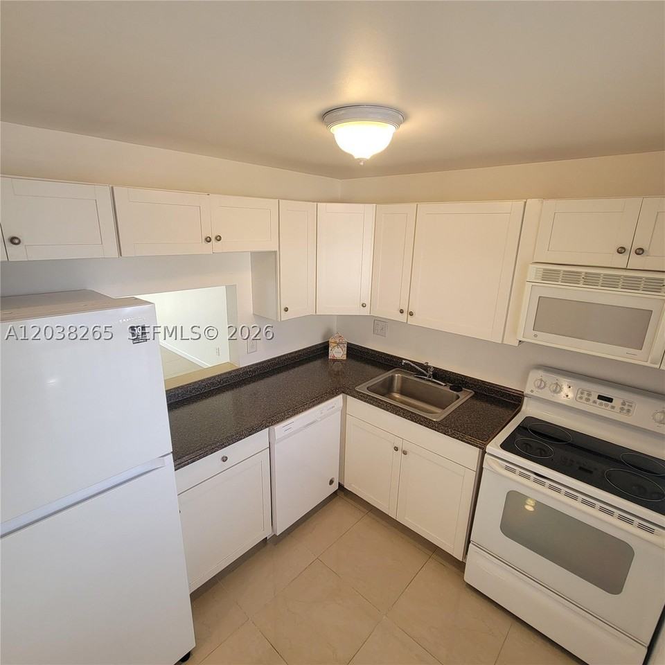 6021 Nw 61st Ave #207 - Photo 6 of 32