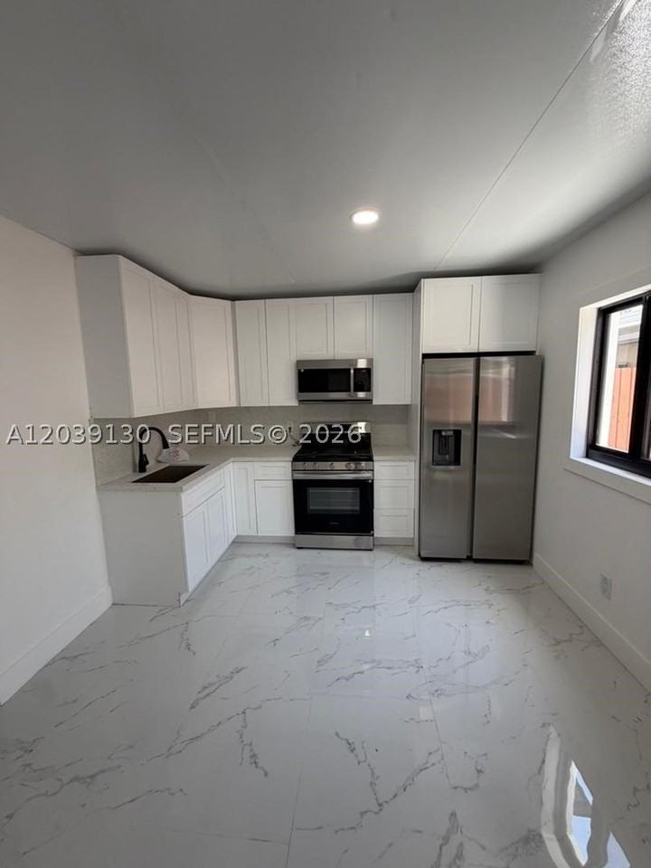1230 Nw 135th St - Photo 2 of 6
