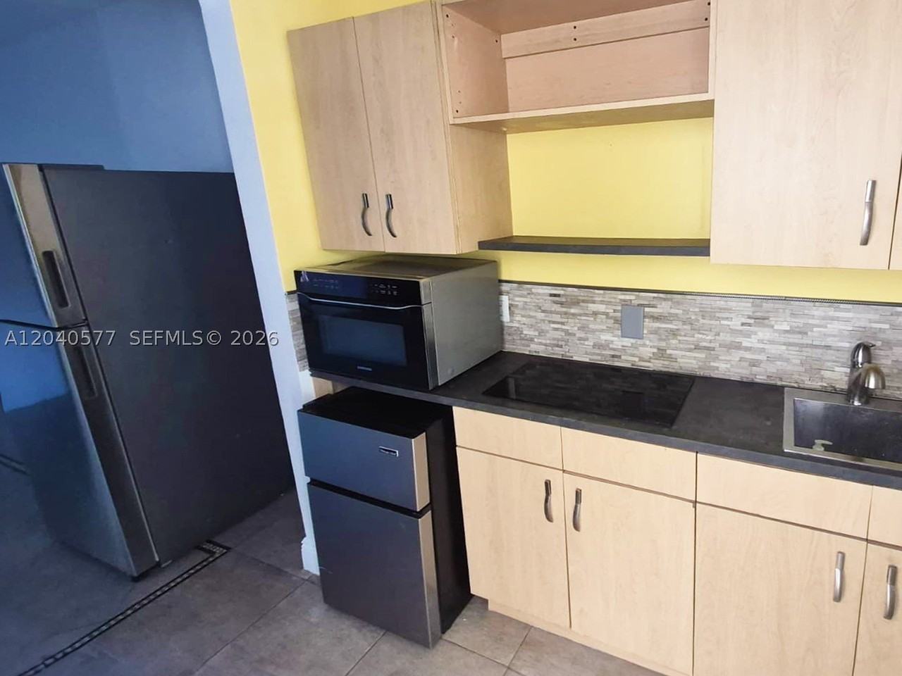 585 Ne 66th St #3 - Photo 4 of 12