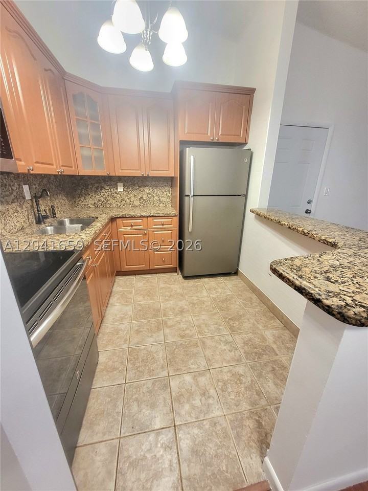 18845 Nw 62nd Ave #207 - Photo 3 of 16
