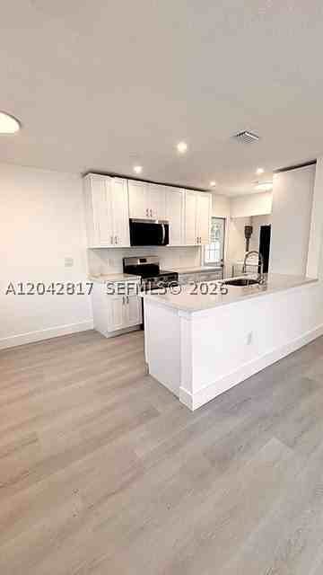 721 N 68th Ter - Photo 4 of 16