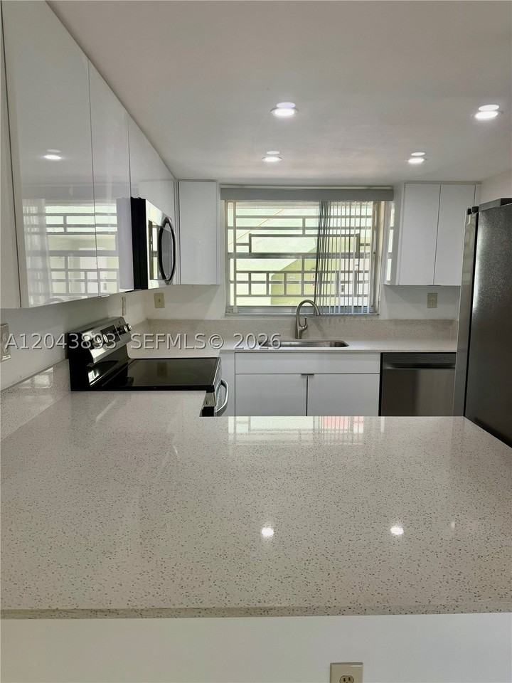 11123 Nw 7th St #103-4 - Photo 2 of 15