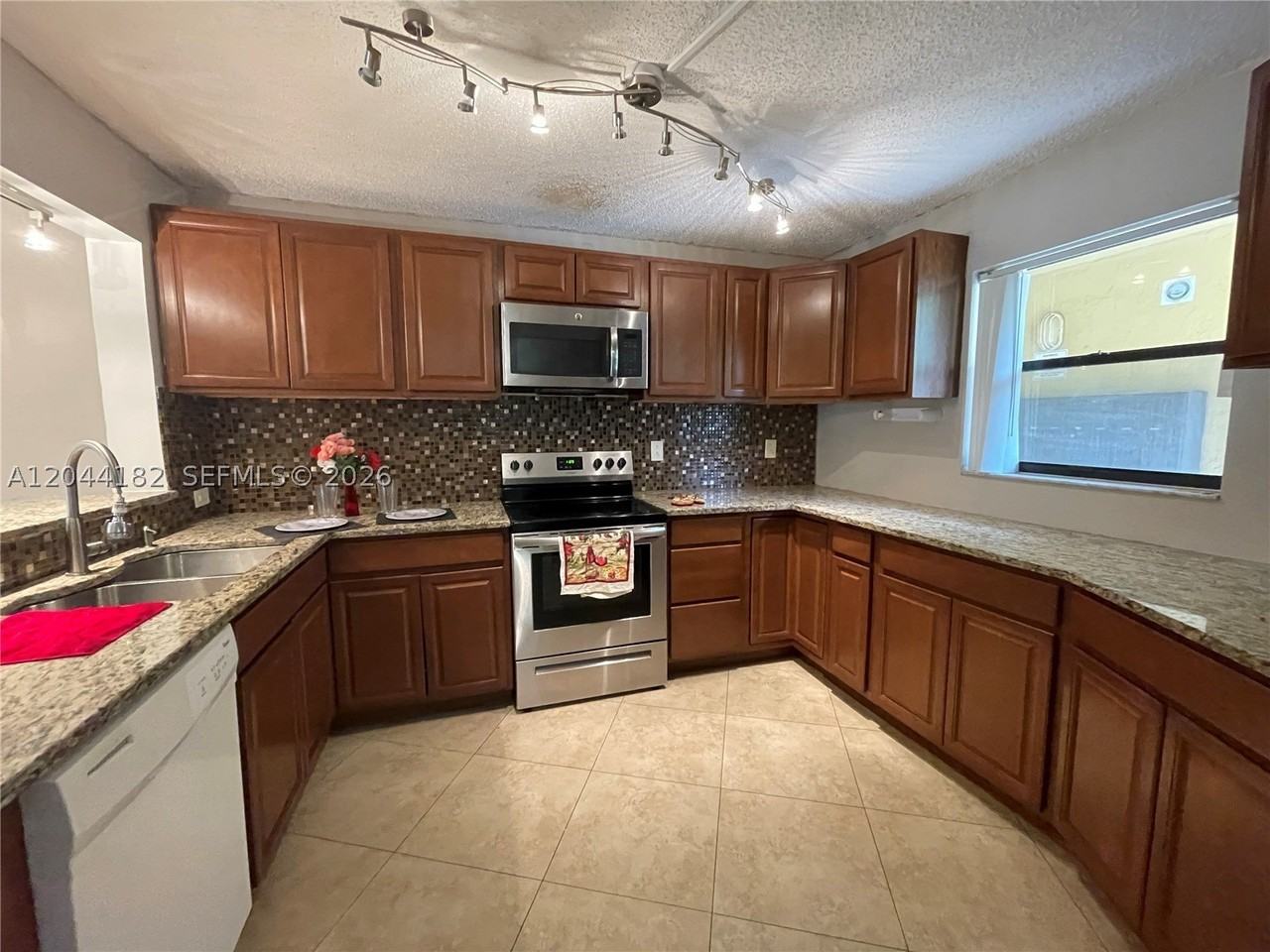 9044 Nw 28th Dr #3-106 - Photo 3 of 11