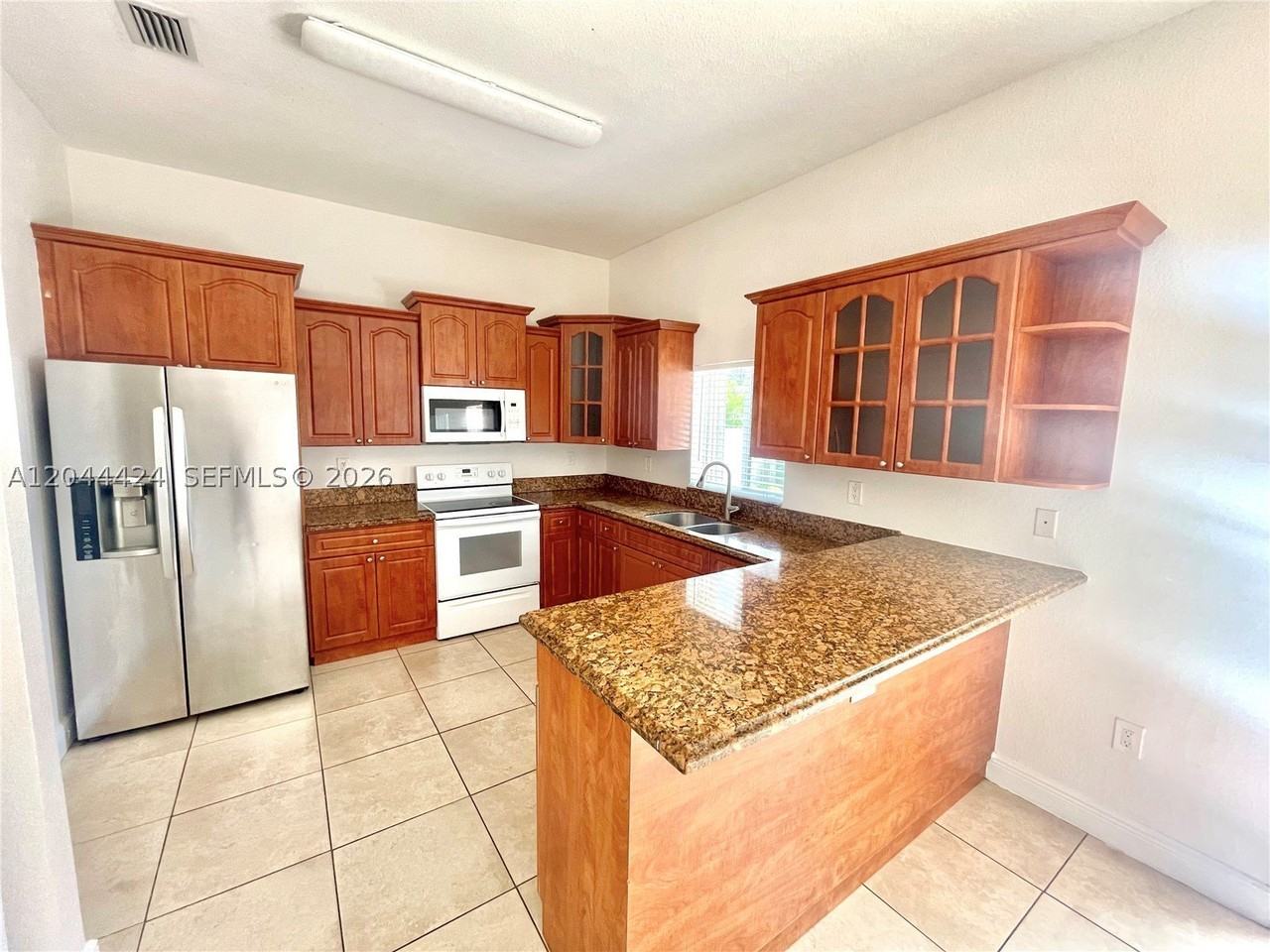 2487 W 5th Ct - Photo 7 of 16