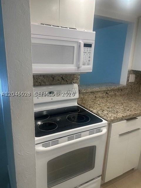 10395 N Kendall Dr #V4 - Photo 4 of 13