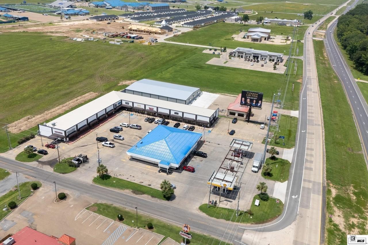 8649 Highway 165 N - Photo 2 of 26