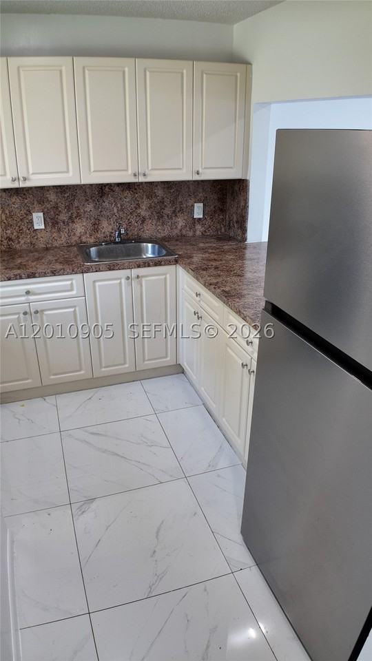 10900 Sw 196th St #103 - Photo 2 of 17