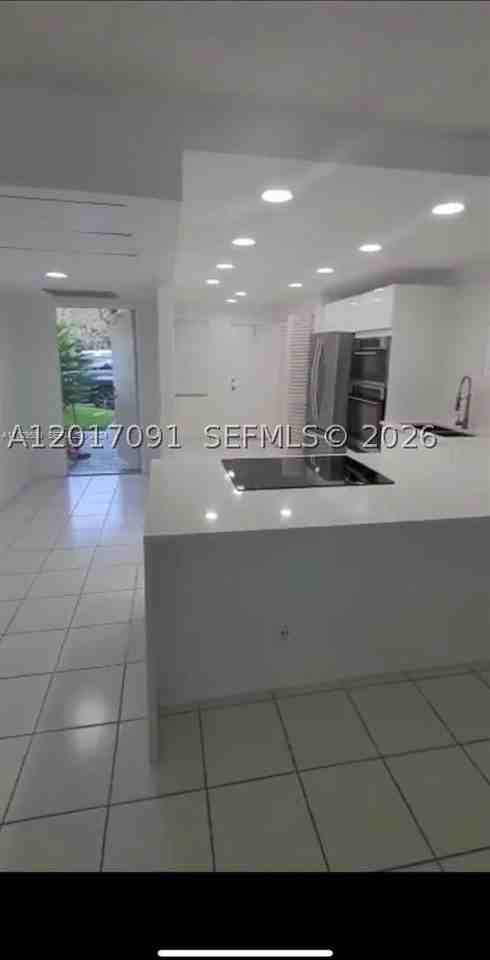 3145 N Palm Aire Dr #103 - Photo 2 of 8