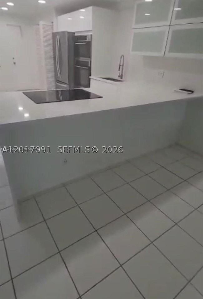 3145 N Palm Aire Dr #103 - Photo 3 of 8