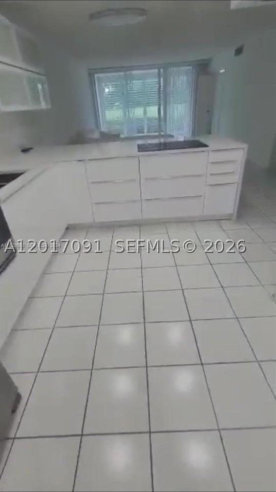 3145 N Palm Aire Dr #103 - Photo 4 of 8