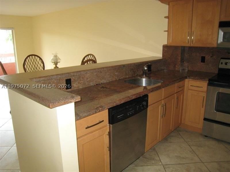 7722 Camino Real #E301 - Photo 2 of 20