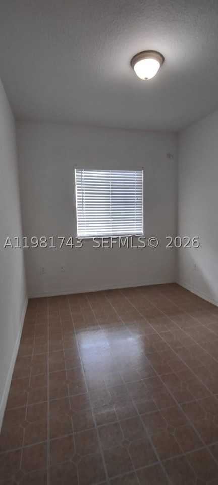 6940 Nw 179th St #303-7 - Photo 3 of 20