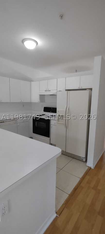 6940 Nw 179th St #303-7 - Photo 5 of 20