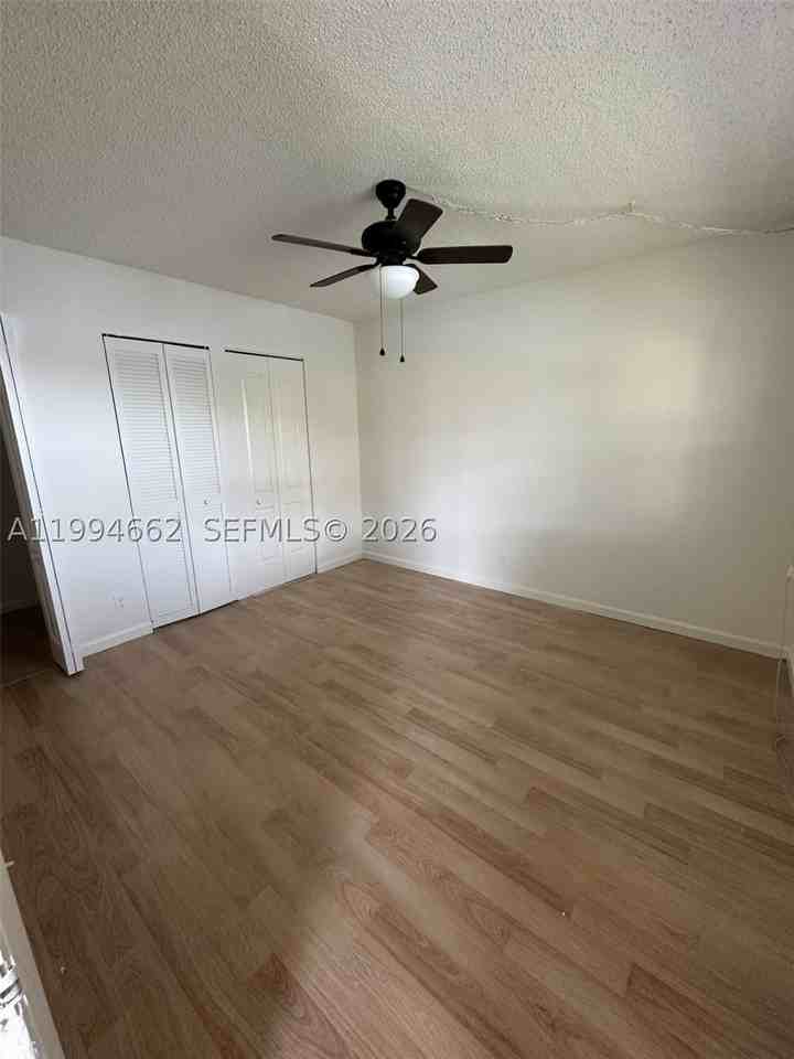 10003 Winding Lake Rd #103 - Photo 3 of 12