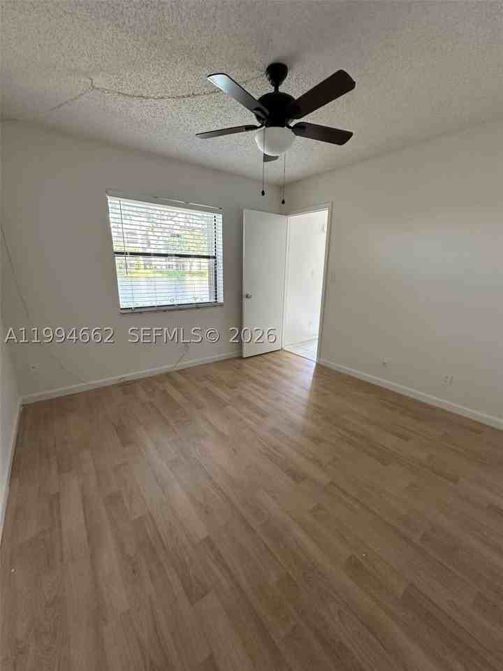 10003 Winding Lake Rd #103 - Photo 4 of 12