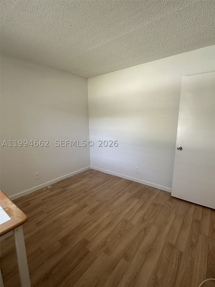 10003 Winding Lake Rd #103 - Photo 5 of 12
