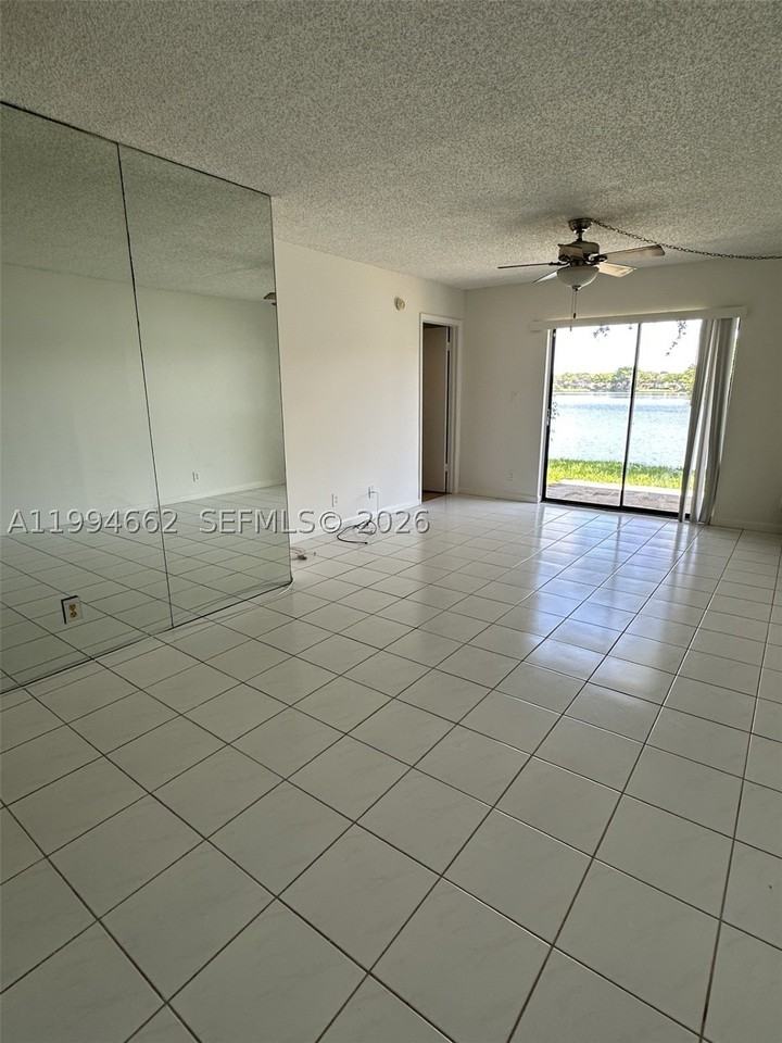10003 Winding Lake Rd #103 - Photo 6 of 12