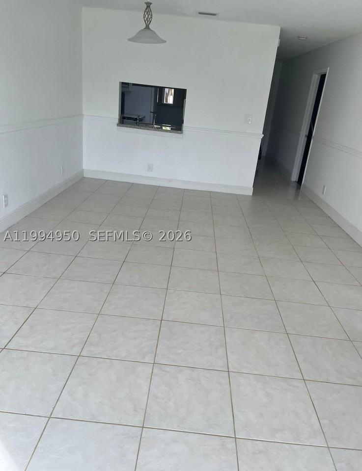 7435 Woodmont Ter #202 - Photo 5 of 17