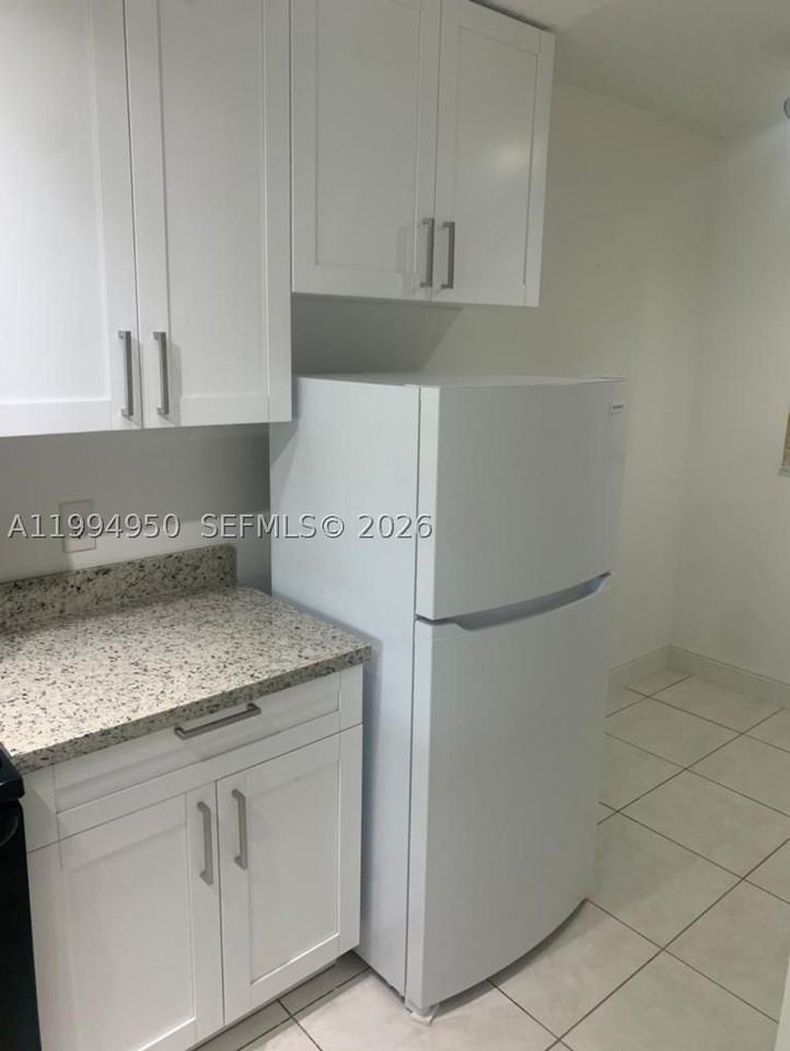7435 Woodmont Ter #202 - Photo 6 of 17