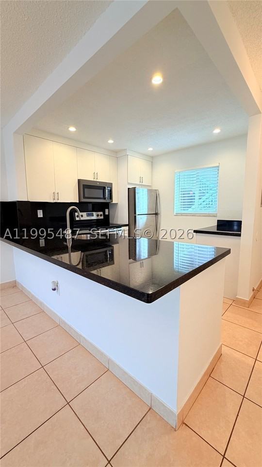7740 Camino Real #G303 - Photo 6 of 16
