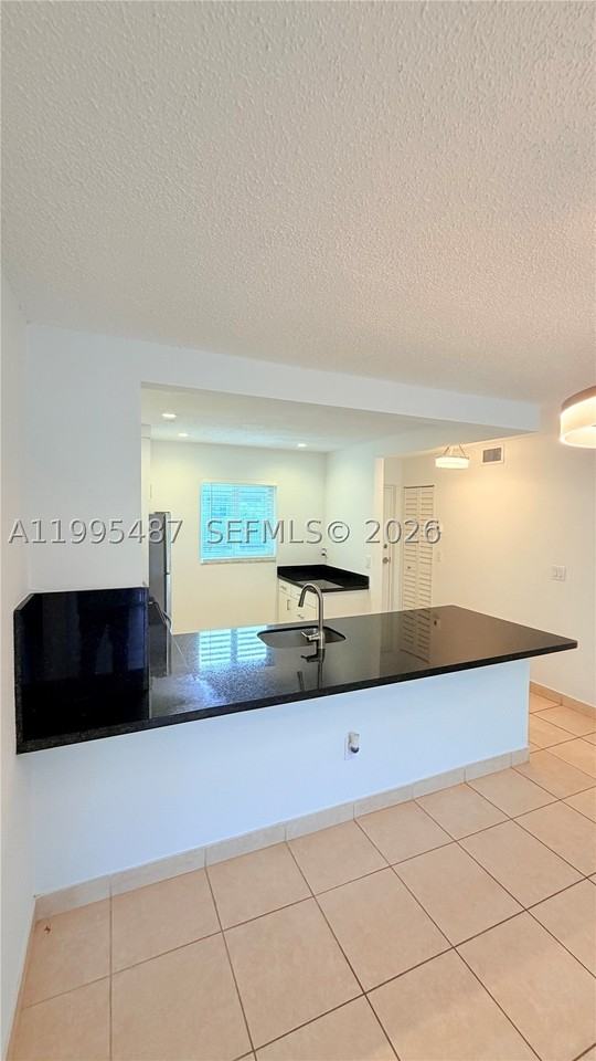 7740 Camino Real #G303 - Photo 7 of 16