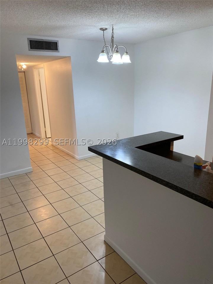 9608 W Mcnab Rd #103 - Photo 2 of 8