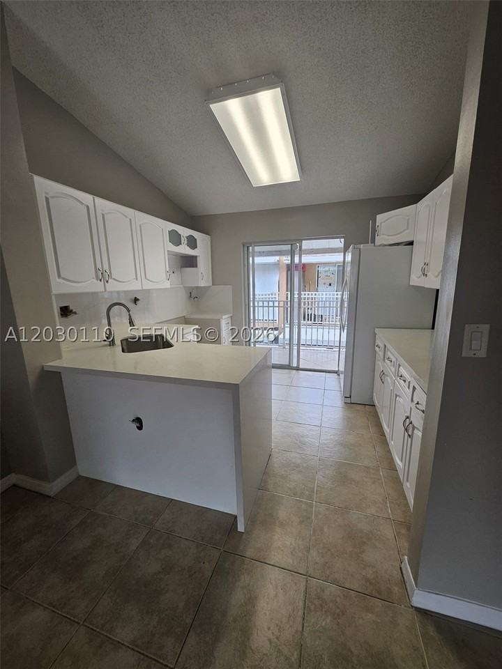 2527 W 76th St #208 - Photo 3 of 21