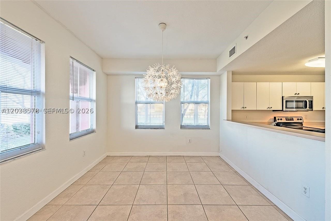 10901 Nw 83rd St #104 - Photo 4 of 19