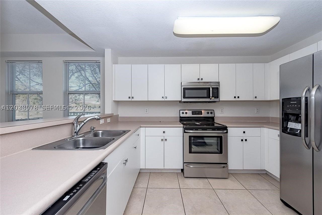 10901 Nw 83rd St #104 - Photo 7 of 19